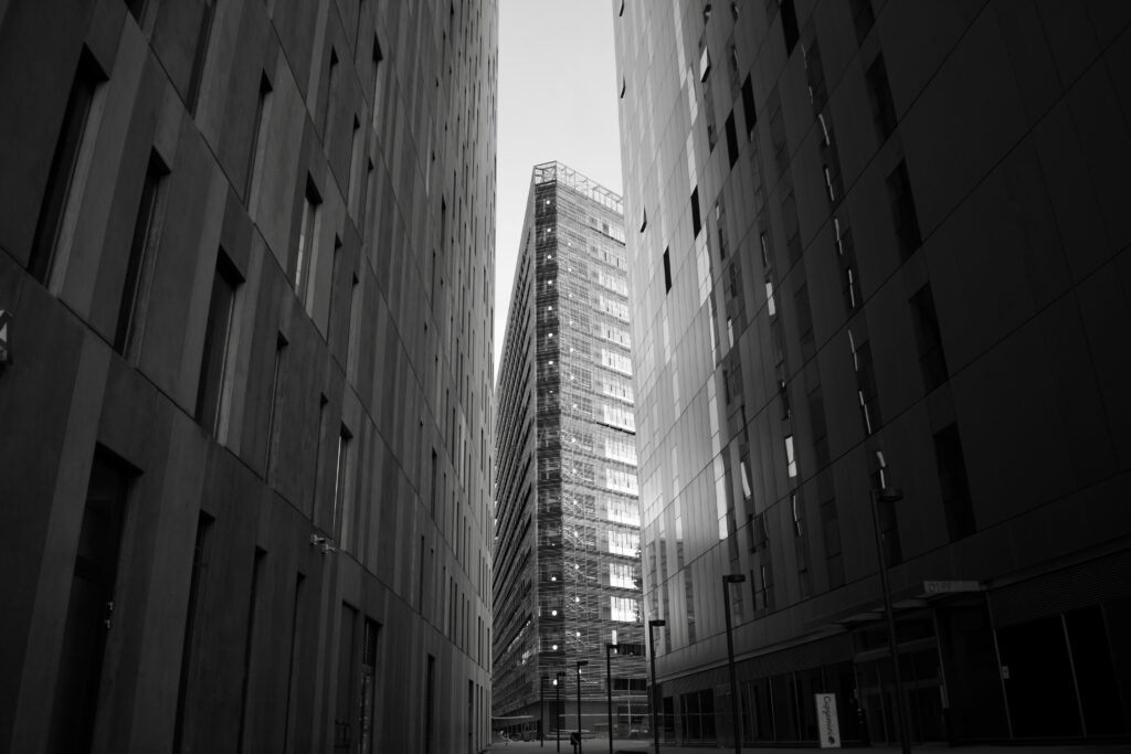 grayscale photo of high rise building