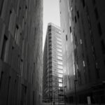 grayscale photo of high rise building